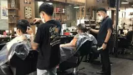Crown barbershop makassar